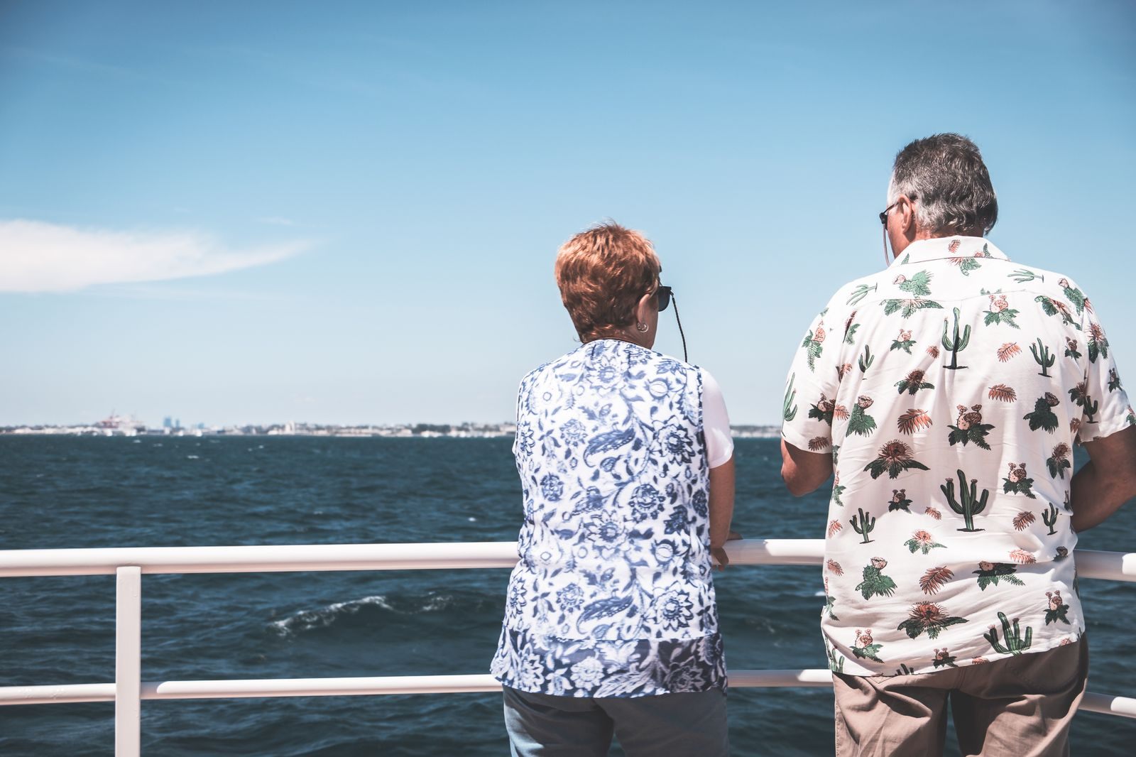 Mature couple relaxing on the deck of a cruise ship