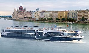 River cruise ship on the Danube in front of the Hungarian Parliament